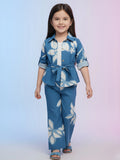 Little girl modeling a 3-piece blue and white floral print set featuring a belted button-down shirt with a white inner top and matching wide-leg pants.